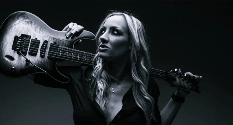 Alice Cooper’s Nita Strauss’ Masked Photo Revealed: “Well, It’s Official”