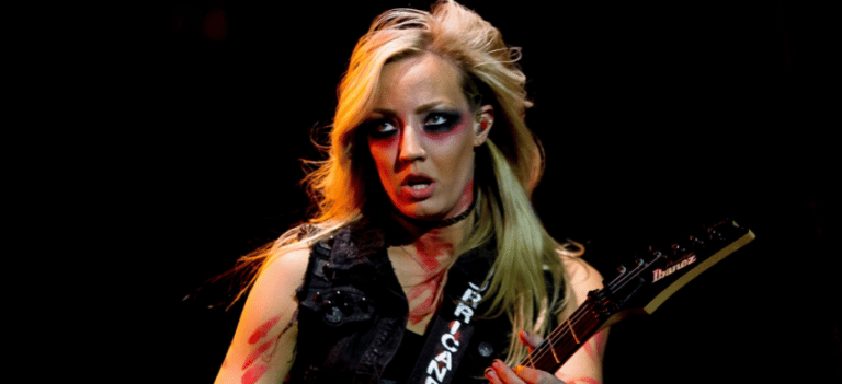 Nita Strauss Sends Her Support To Alice Cooper’s Huge Campaign With An Extraordinary Pose