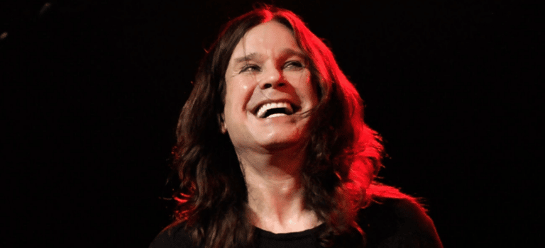 Black Sabbath’s Ozzy Osbourne Poses With A Furry Jacket In The Beach
