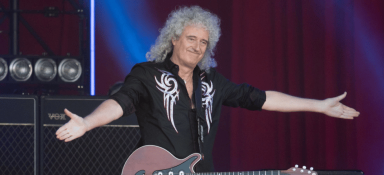 Brian May’s Little-Known Stage Pose Revealed By Queen