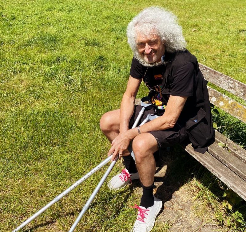 Queen's Brian May around a hospital