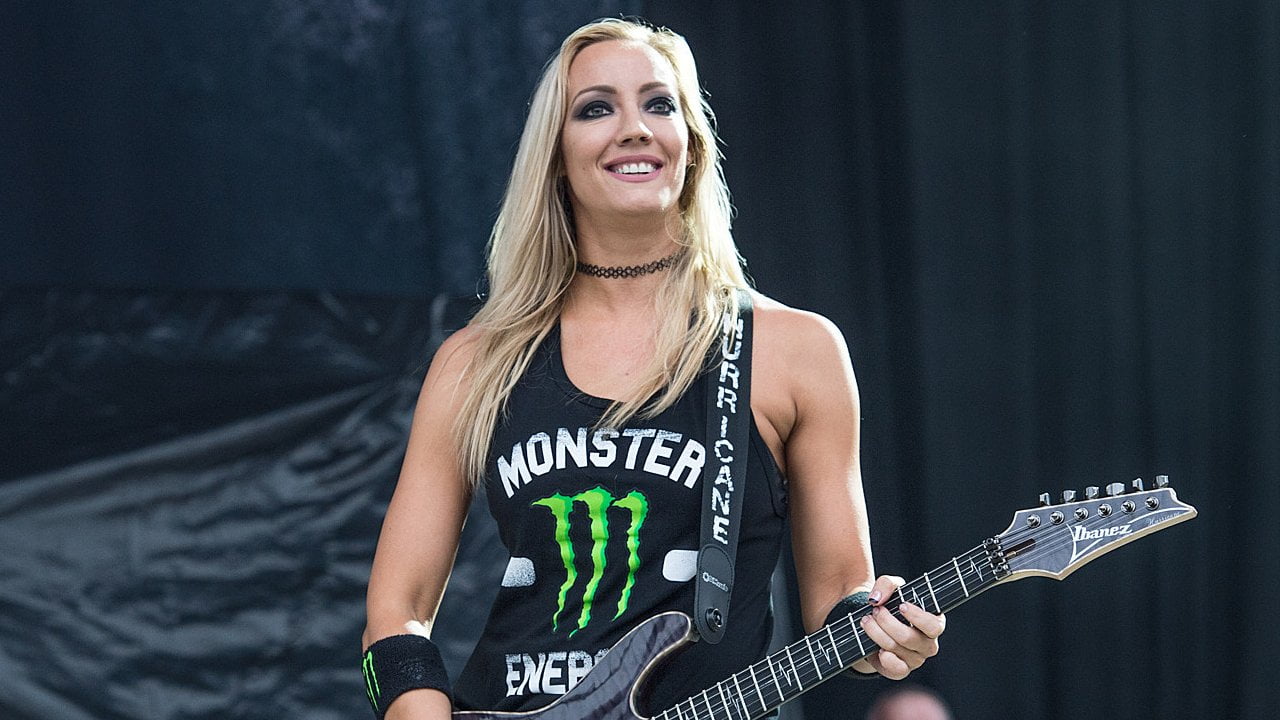 Alice Cooper guitarist Nita Strauss on stage.