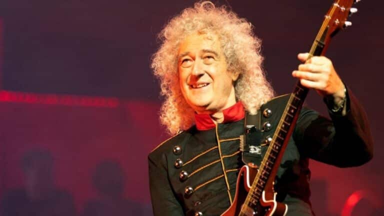 Brian May Looks Mesmerized Over Queen Fans’ Singing ‘We Are The Champions’: “I Had A Rare Moment”