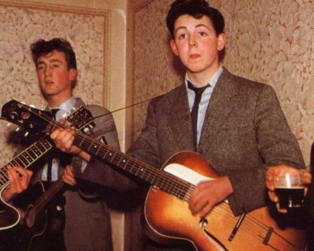 Paul McCartney with his first guitar Epiphone Zenith 17