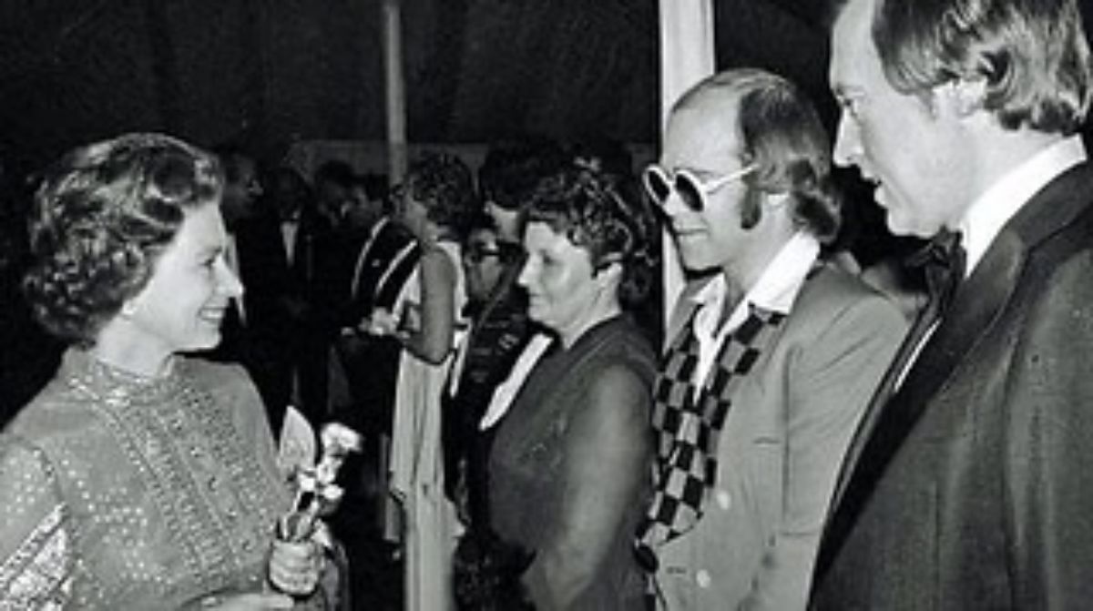 Queen Elizabeth with Elton John